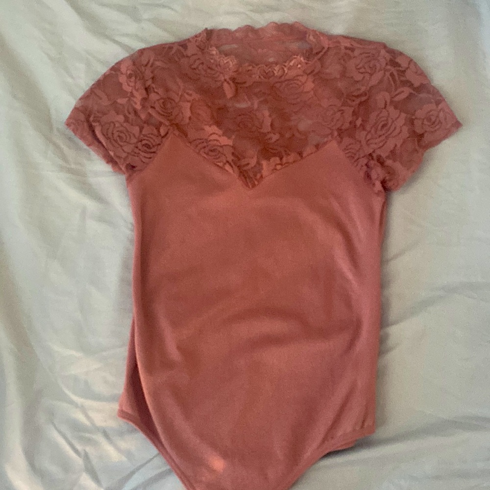 Light pink body suit